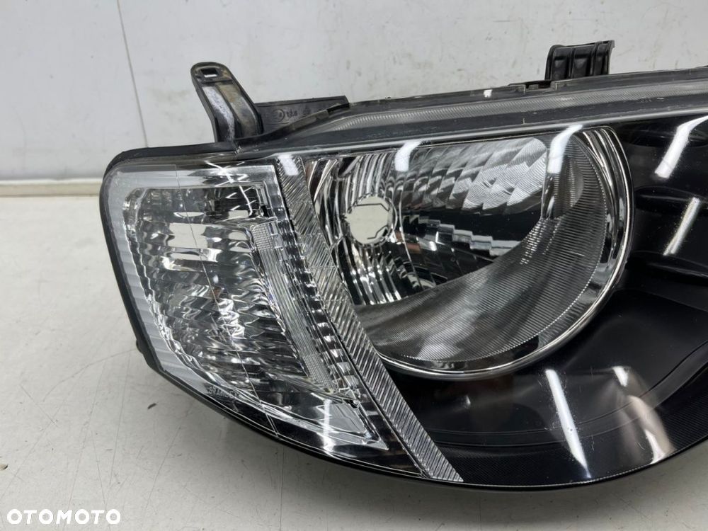 Lampa reflektor Mitsubishi L200 KA KB 05-10r. PRAWA przednia H4 oryginalna prawy przód EU 8301b462 - 4