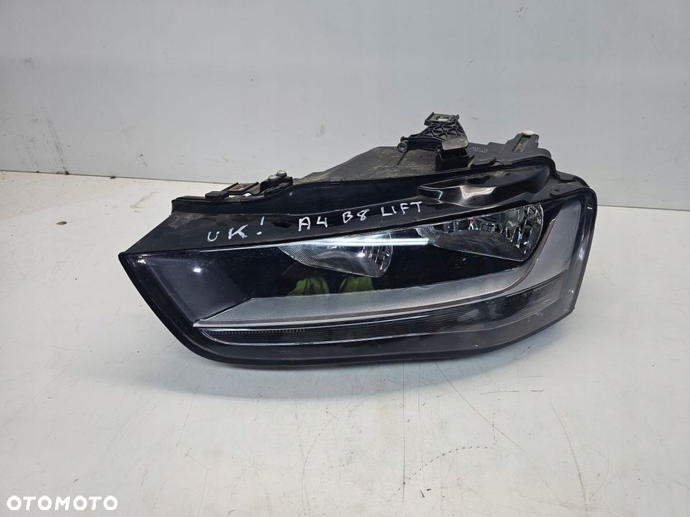 REFLEKTOR LEWY AUDI A4 B8 LIFT UK 8K0941003M