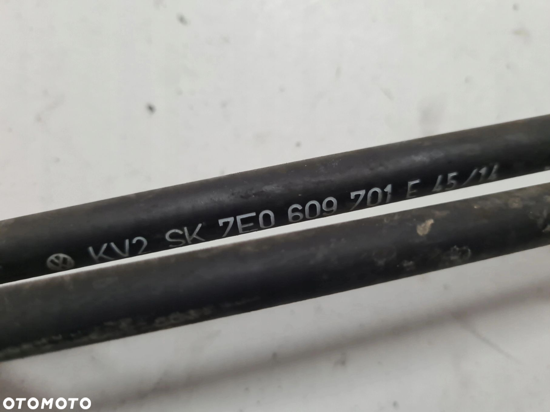 VW T5 linka cięgno hamulca ręcznego 7E0609701E - 3