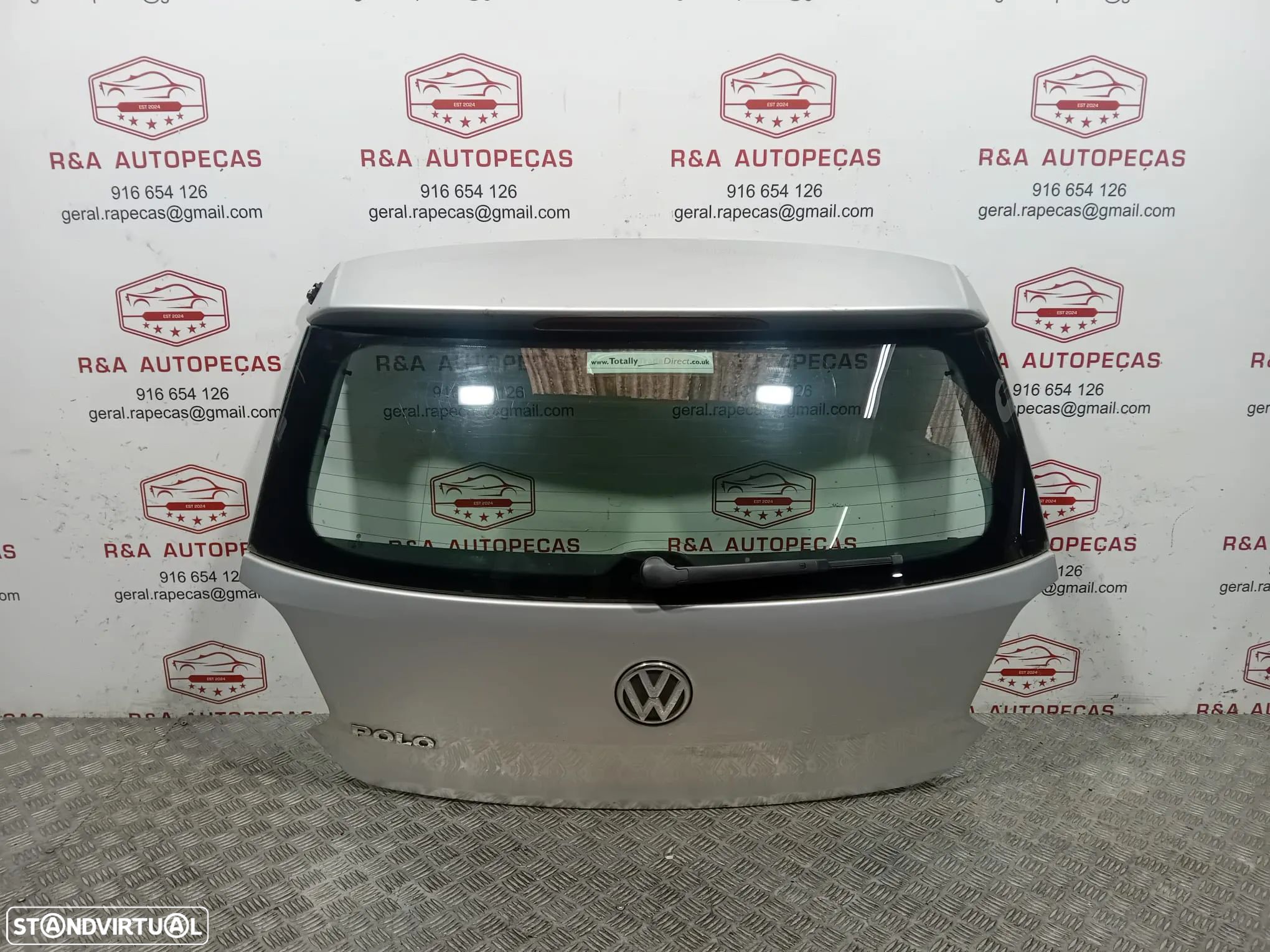 Tampa de Mala VW Polo 6R Original - 1