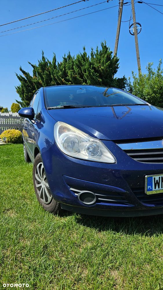 Opel Corsa 1.2 16V Cosmo - 1
