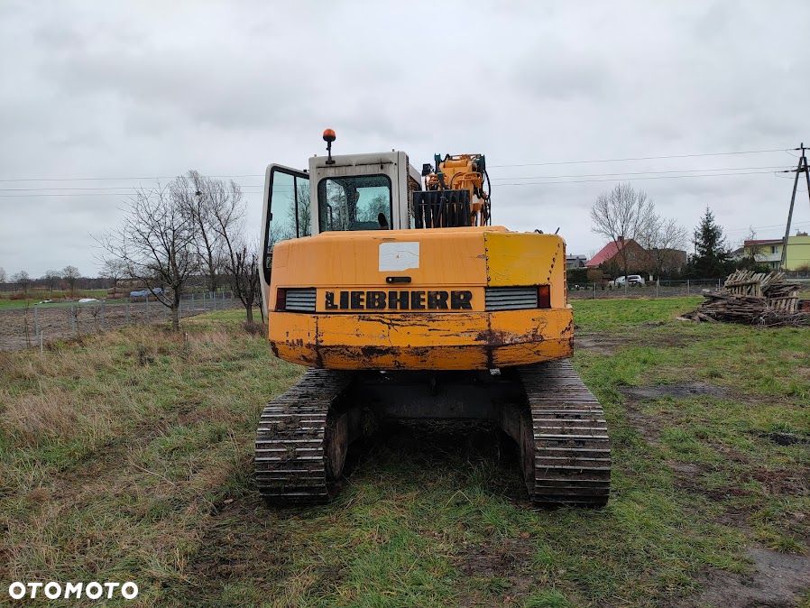 Liebherr R312 - 5