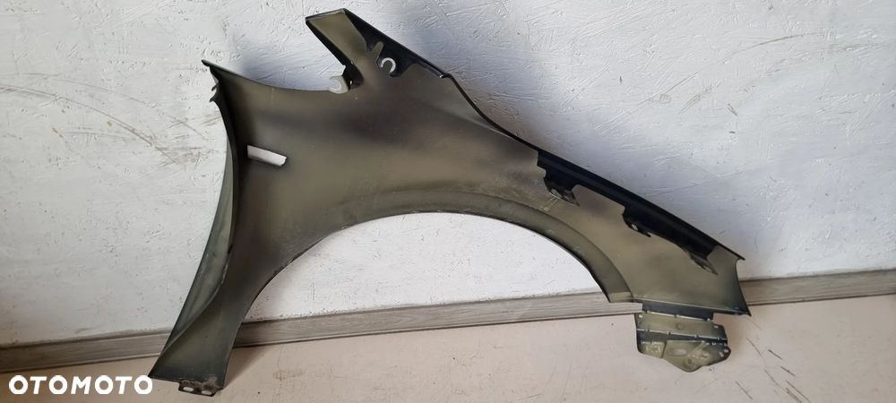 Błotnik przód lewy OPEL ASTRA GTC 4 J IV CASCADA '12-'15 - 5