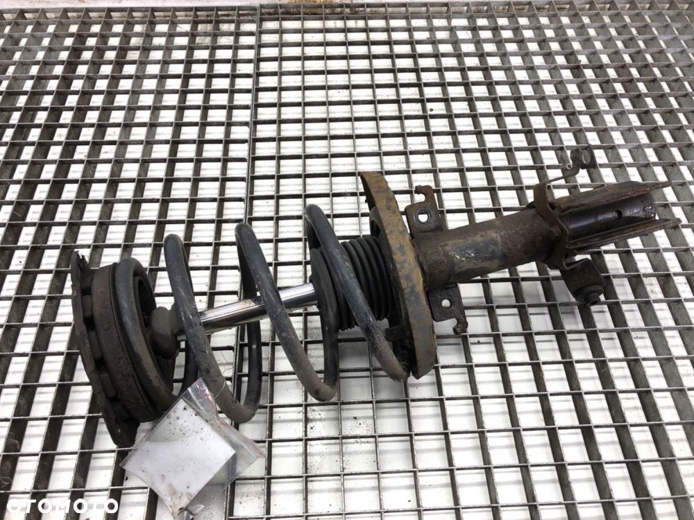 AMORTYZATOR LEWY PRZÓD ZE SPRĘŻYNĄ - 101.00 PLN - RENAULT MEGANE III Grandtour (KZ0/1) 2008 - - 1