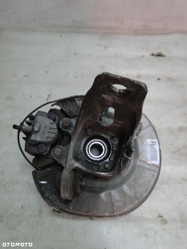 BMW 5 E60 E61 PIASTA ZWROTNICA ZACISK TARCZA LEWA TYŁ TYLNA 2.0D EUROPA - 2