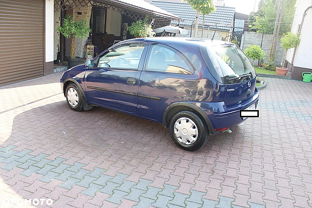 Opel Corsa 1.2 16V Cosmo - 8