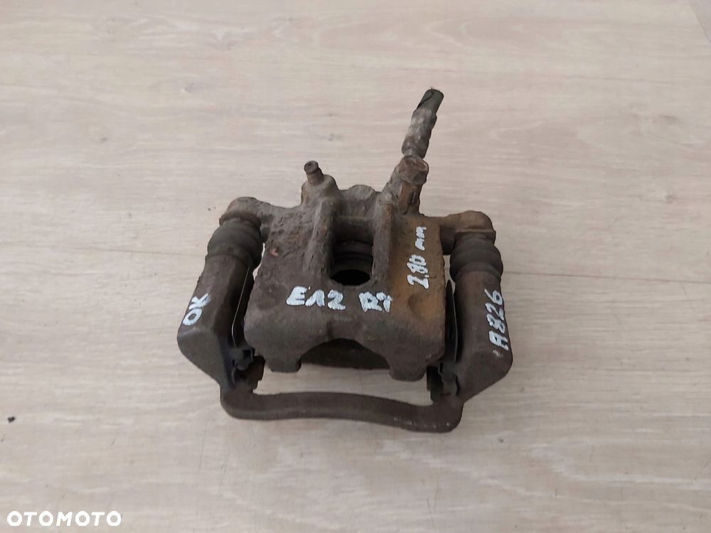 Toyota Corolla E12 zacisk jarzmo tył prawy TRW 275mm - 1