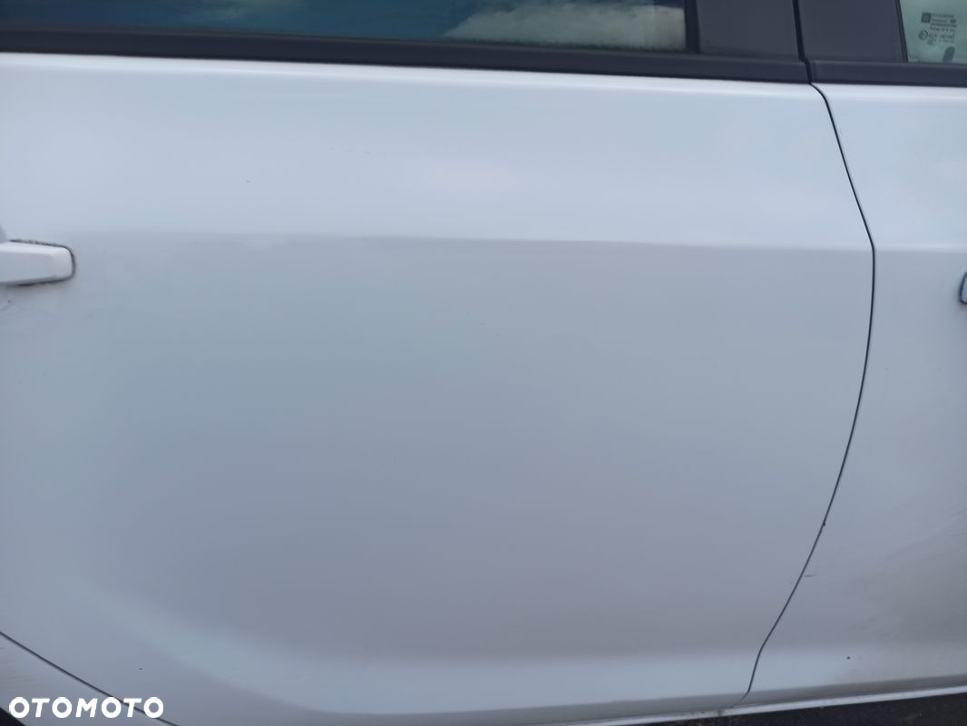 Drzwi prawy tył kompletne OPEL ASTRA IV J KOMBI Y40R 10-15 - 2
