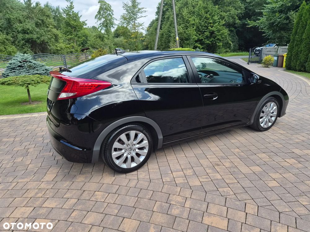 Honda Civic 1.8 Comfort - 14