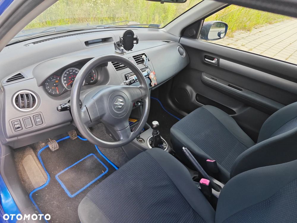 Suzuki Swift 1.3 Club - 11