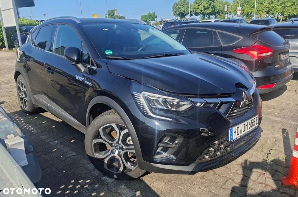 Renault Captur E-TECH 160 ICONIC - 1