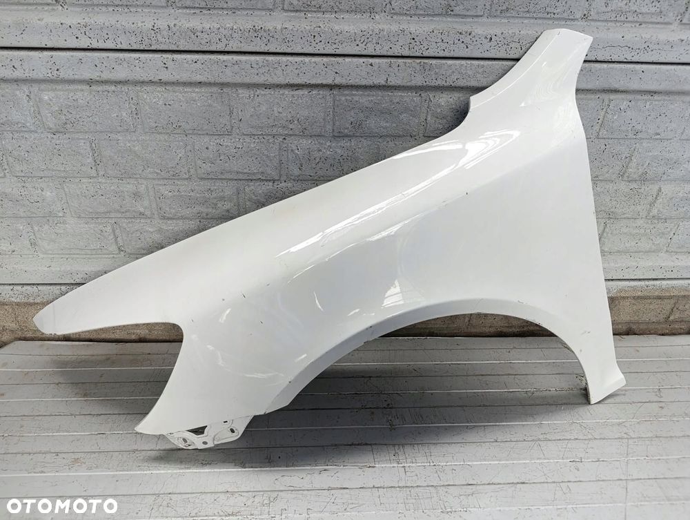 skoda octavia ii 2 lift 08-13 błotnik lewy przód oryginał - 1