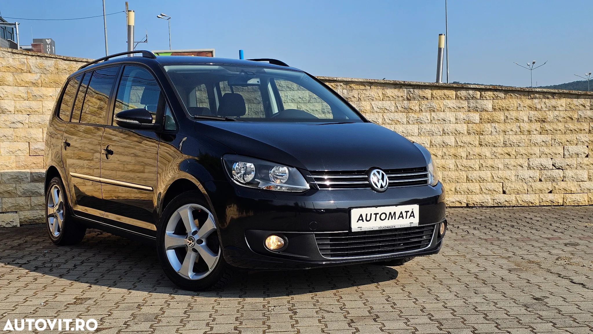 Volkswagen Touran 1.4 TSI DSG Highline - 1