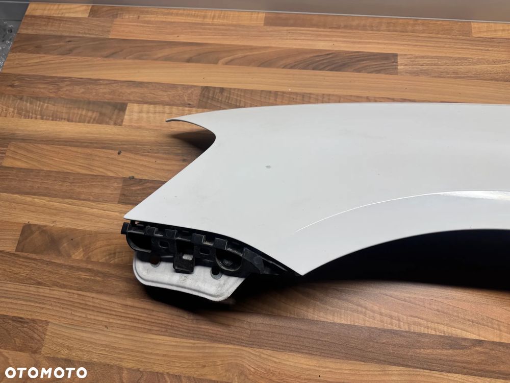 BŁOTNIK LEWY VW PASSAT B7 LB9A - 2