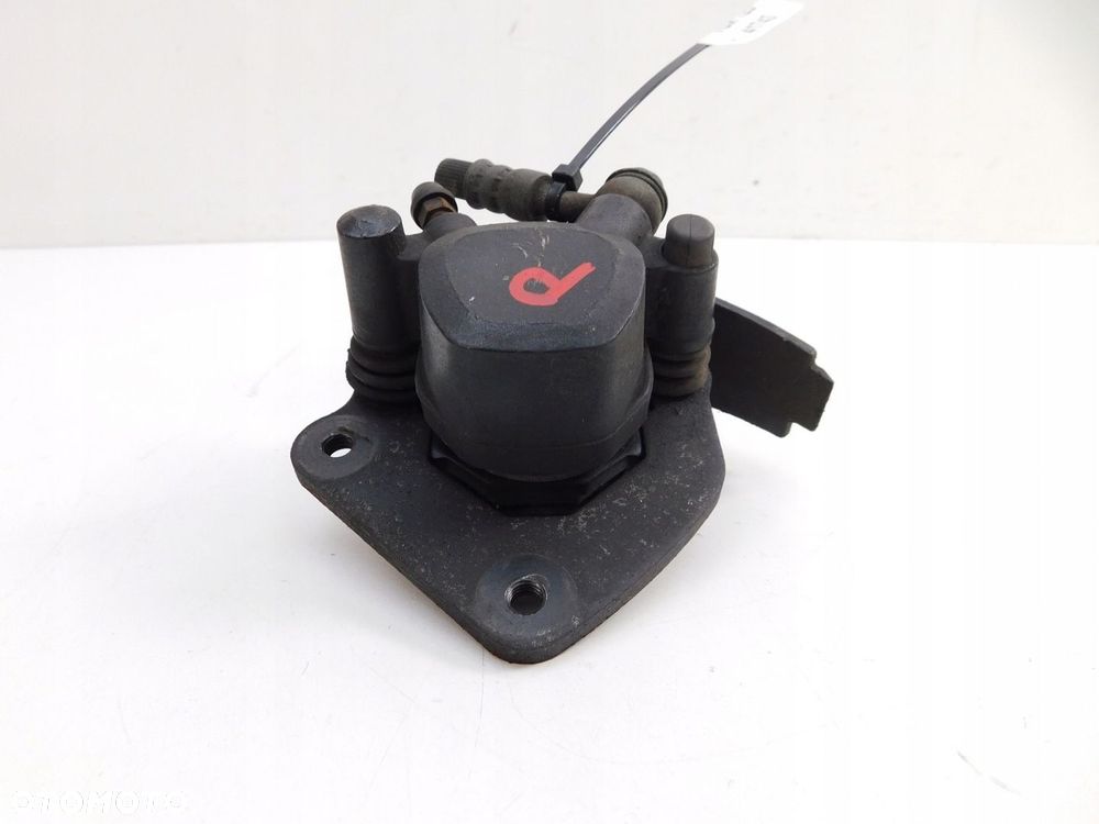 SUZUKI TUX 125 ZACISK HAMULCA PRZÓD - 1