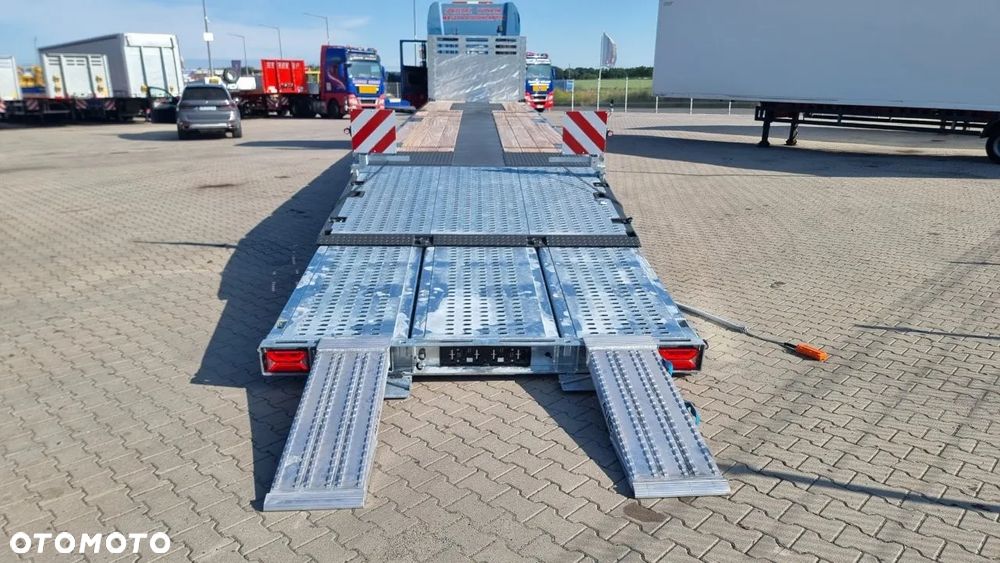 MAX Trailer platforma z hydraulicznie opuszczaną i wysuwaną rampą najazdową - 4