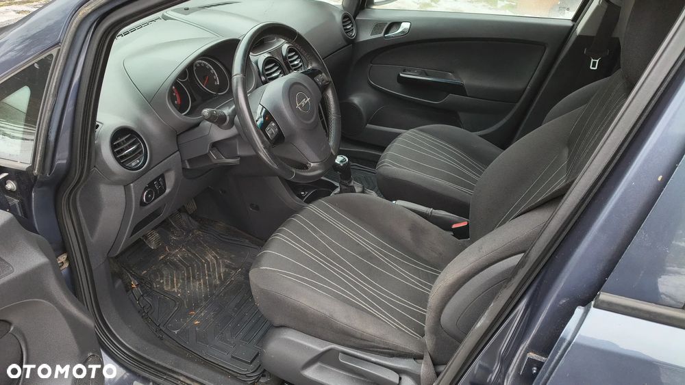 Opel Corsa 1.2 16V Enjoy - 11