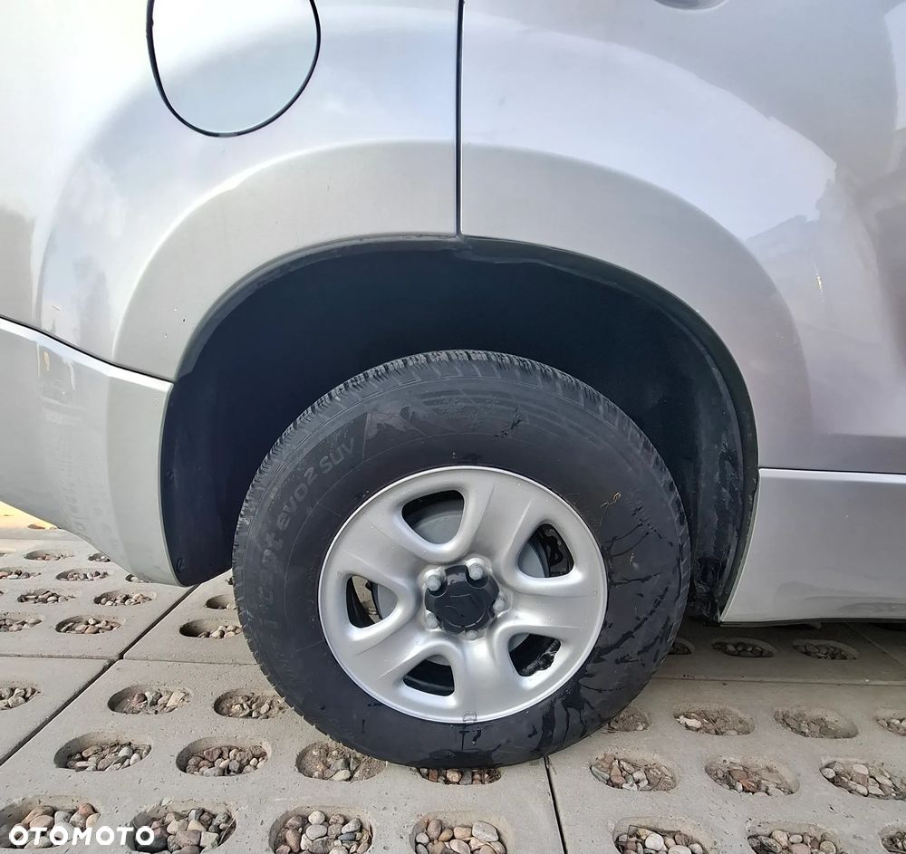 Suzuki Grand Vitara 2.0 - 7