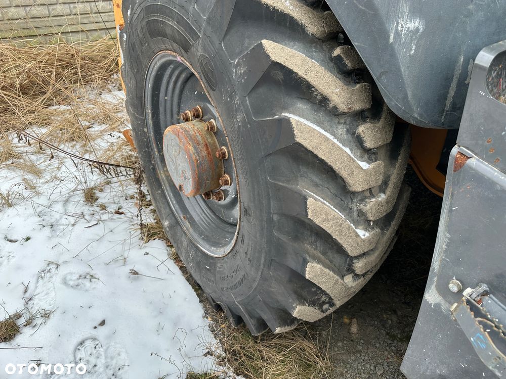 Case 695ST 580 Cat JCB - 9