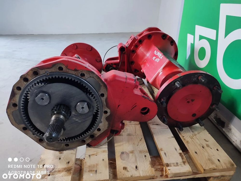 Zwolnica Zwrotnica Półoś 125708  Piasta  McCormick MC 100 - 4