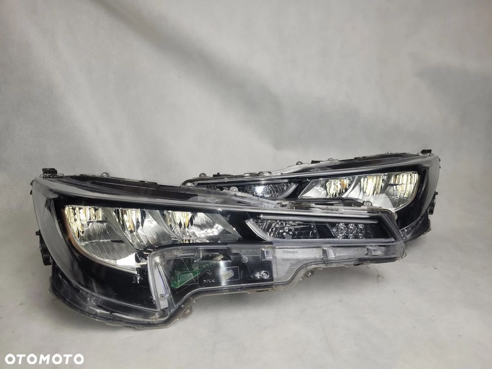 TOYOTA COROLLA E21-LAMPA PRZEDNIA PRZÓD - 3