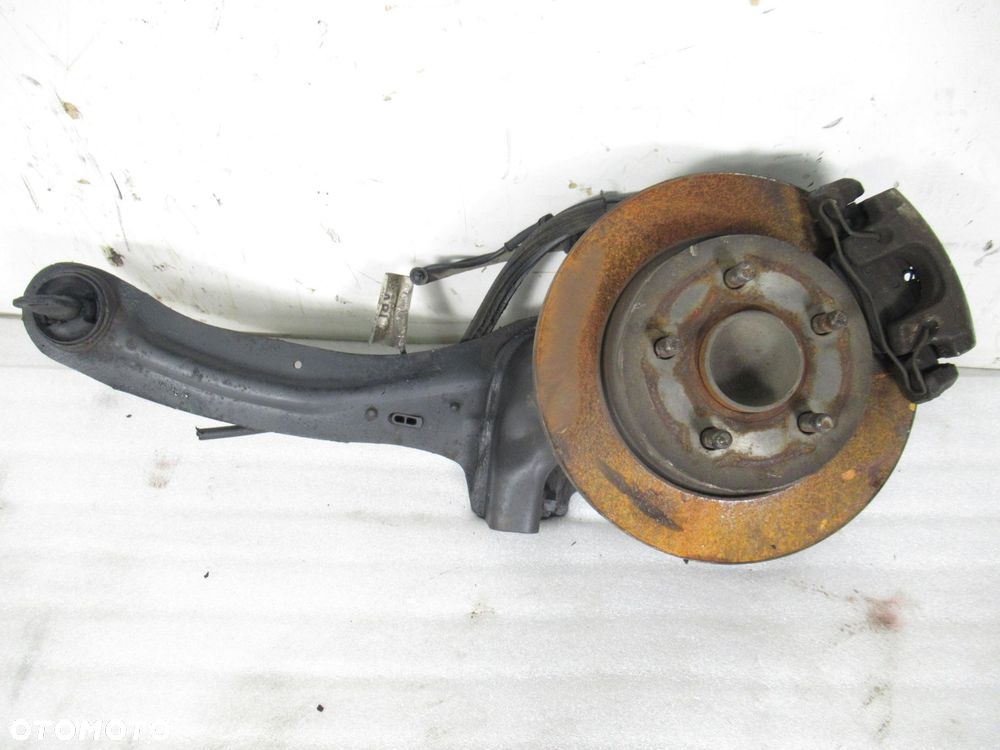 WAHACZ TYLNY LEWY FORD FOCUS MK2 II - 1
