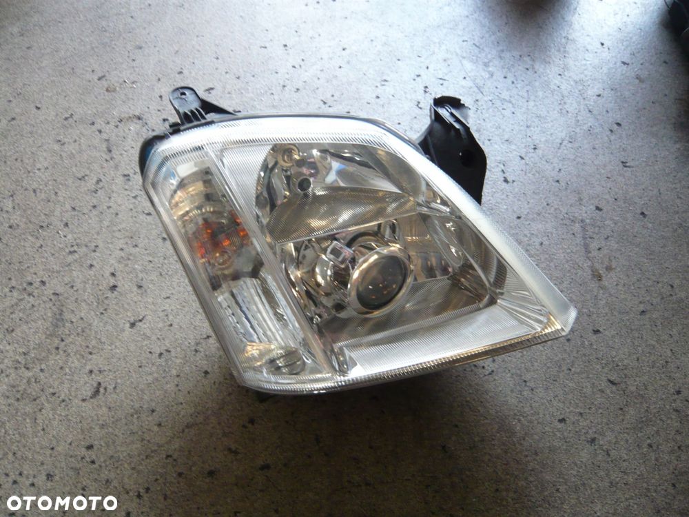 reflektor lampa prawa przód xenon 93321055 opel meriva a - 1