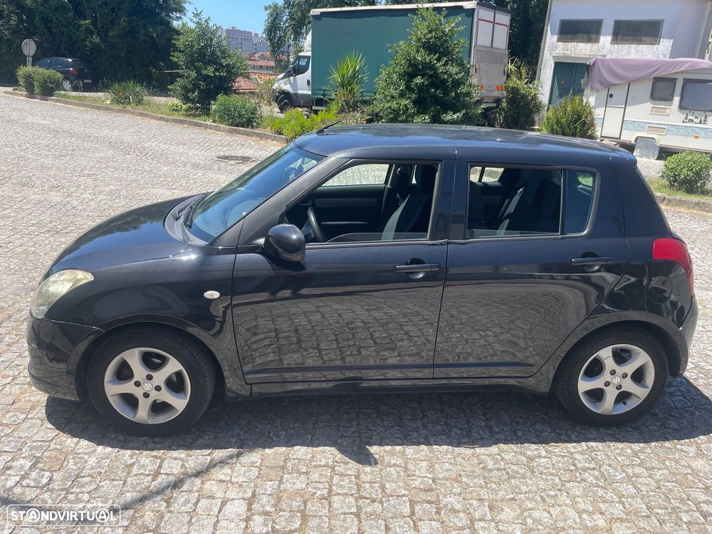 Suzuki Swift 1.3 DDiS GL - 10