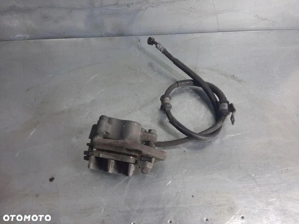 Honda CBF 500 04-08 zacisk hamulcowy przód przedni - 1