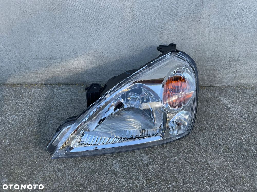 LAMPA PRZEDNIA LEWA SUZUKI LIANA   2001-- NOWA - 1