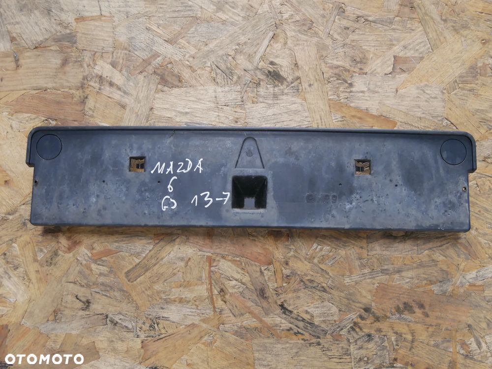 PODSTAWA POD TABLICE MAZDA 6 GJ 13- GHP9-50171 - 1