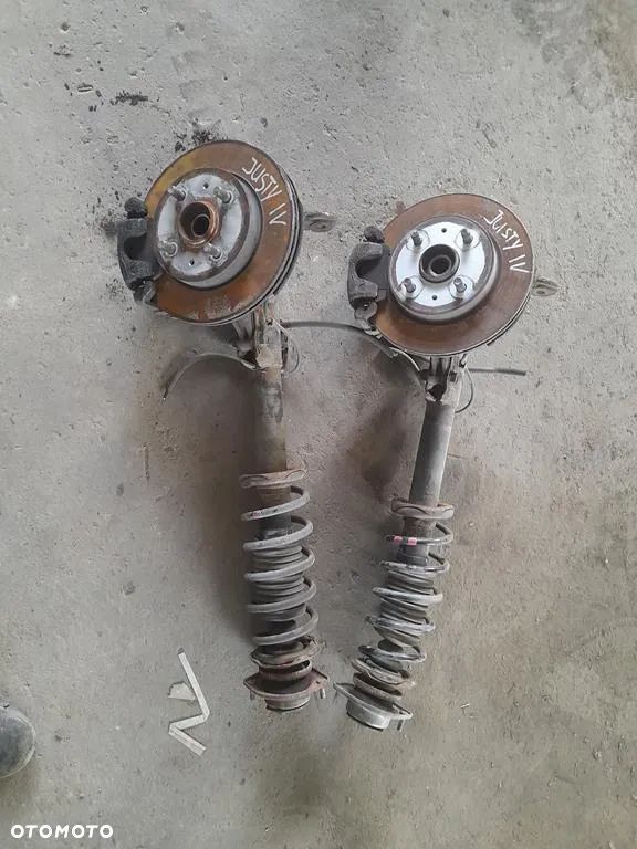 Amortyzator zwrotnica Macpherson Lewy prawy przod Justy IV 4 Sirion II 1.0b - 1