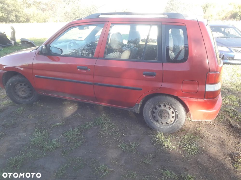 Mazda Demio 97-Klapa Zderzak tylny szybapas  lampa belka Kolor SU - 9