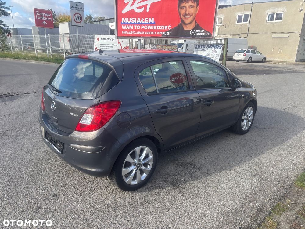 Opel Corsa 1.2 16V Cosmo - 7
