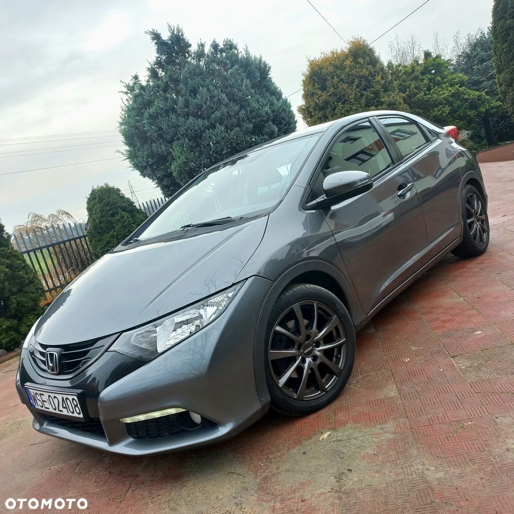 Honda Civic 1.4 i-VTEC Comfort - 1