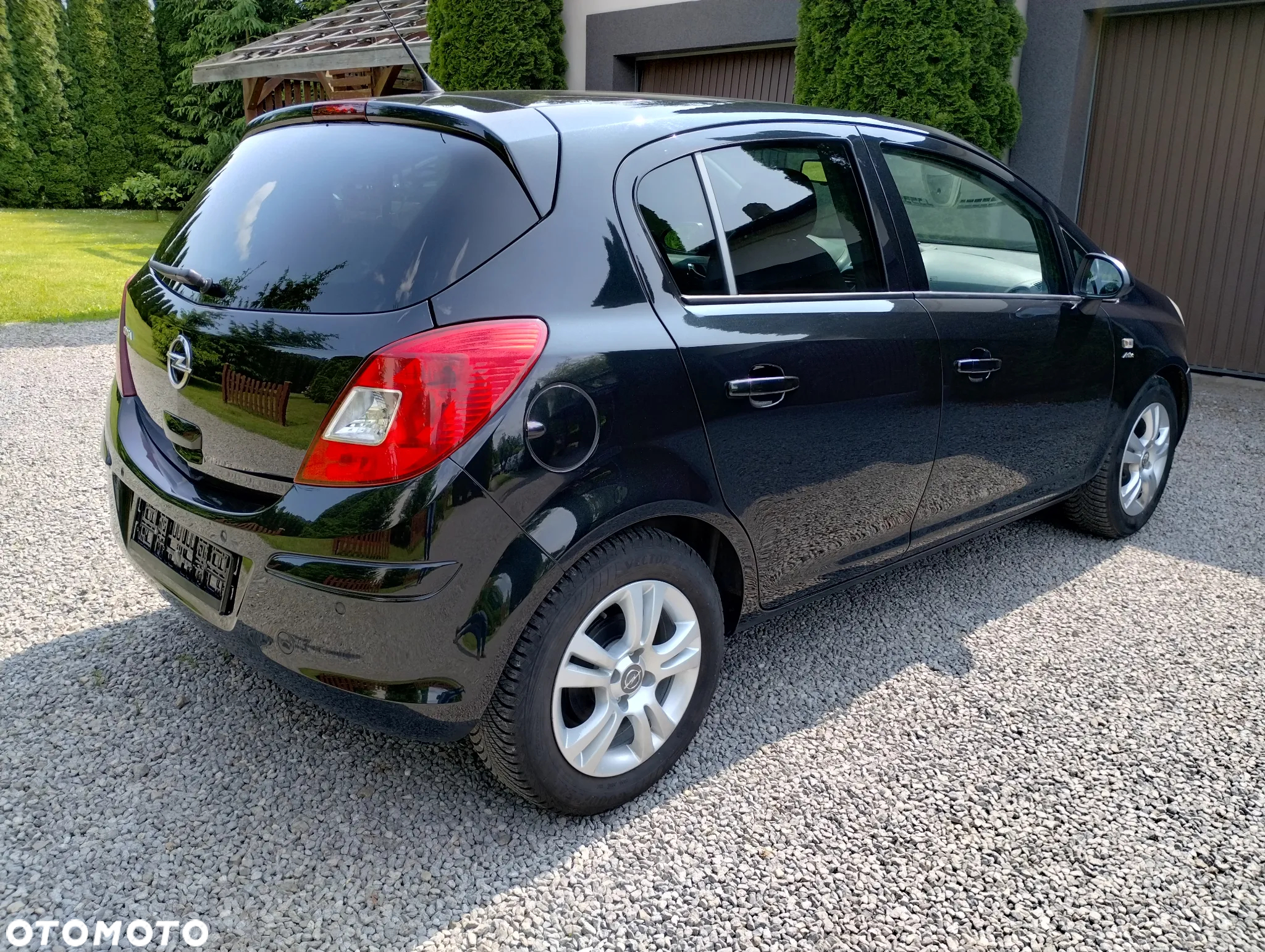 Opel Corsa 1.4 16V Active - 12