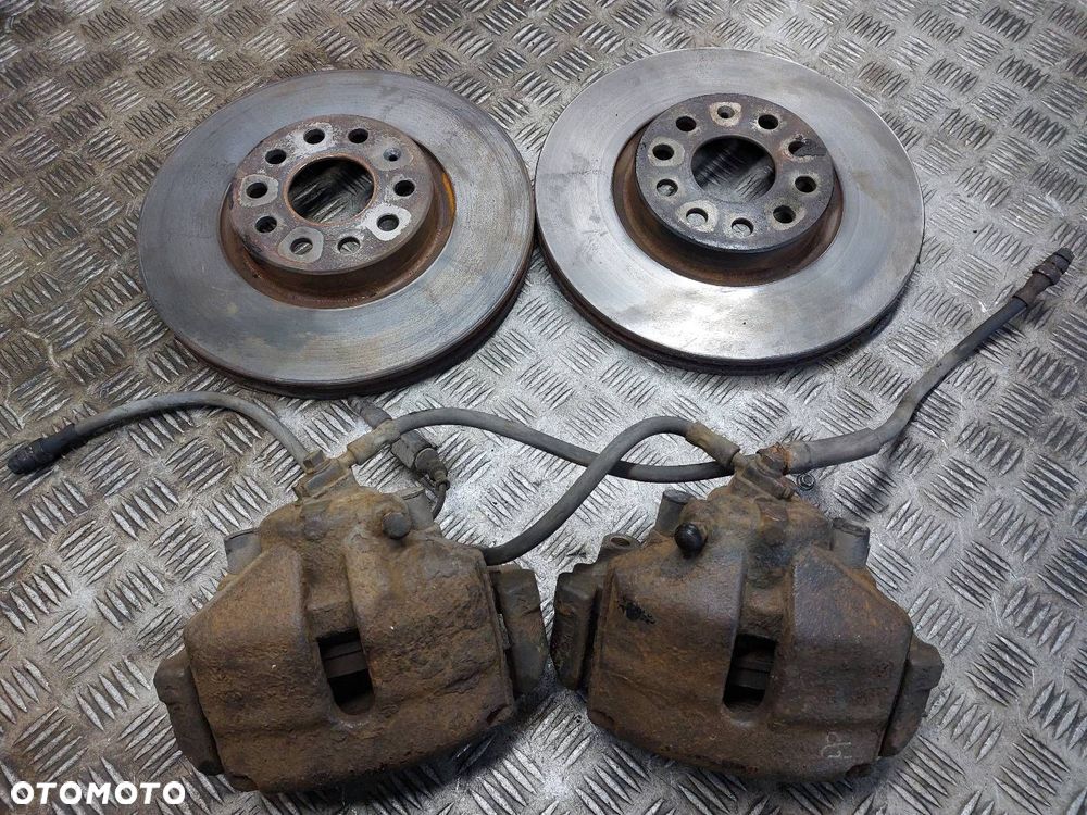 TARCZE HAMULCOWE PRZÓD + KLOCKI + ZACISKI VOLKSWAGEN PASSAT B6 2.0 TDI - 1