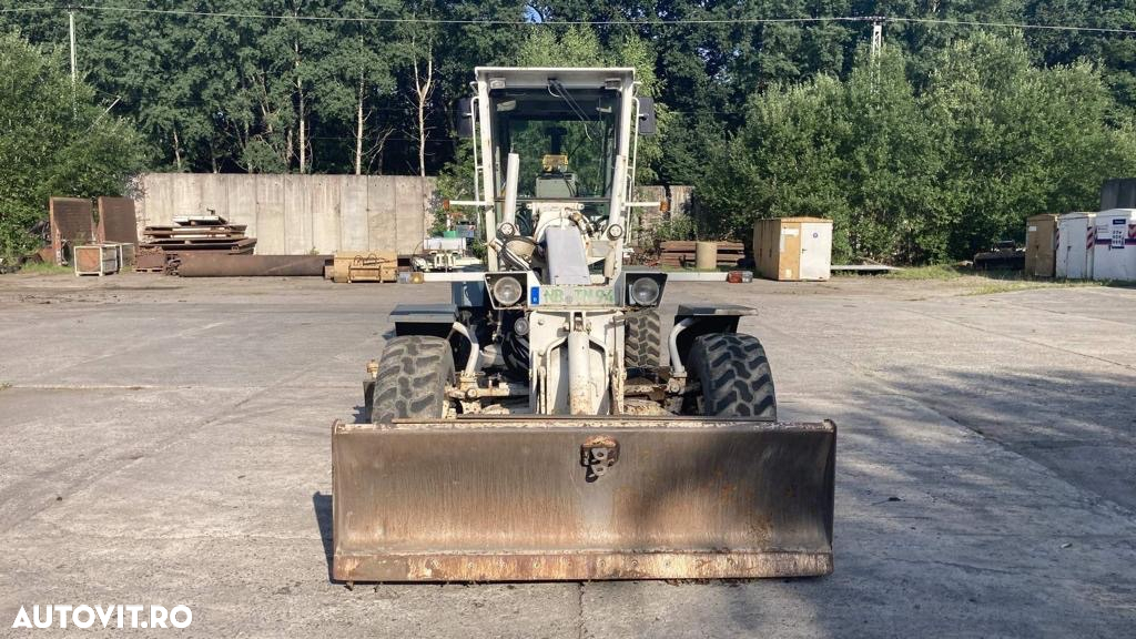 New Holland F106.5 - 12