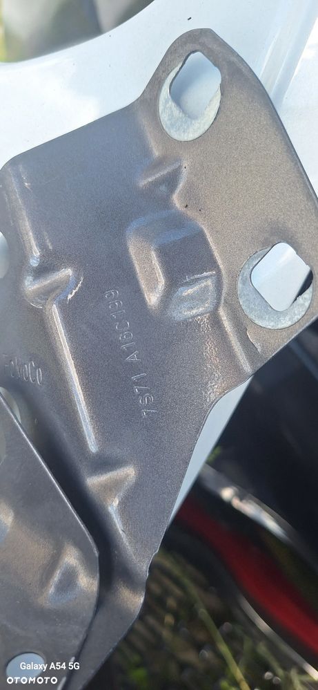 BŁOTNIK FORD MONDEO MK4 lewy lakier kod LA - 11