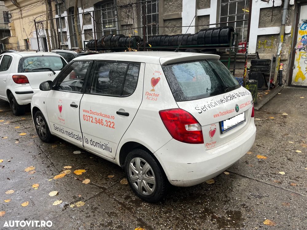 Dezmembrez Skoda Fabia II facelift alb 2011 1,2 benzina - 9