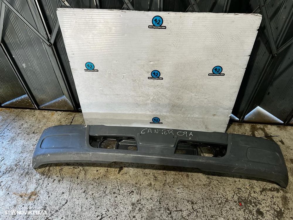 Parachoques Mitsubishi Canter 2009 - 1