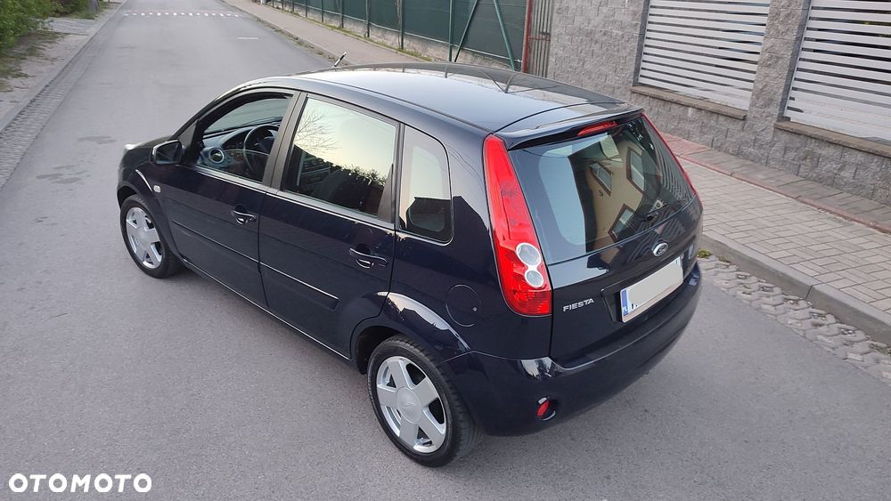 Ford Fiesta 1.4 Ghia - 27