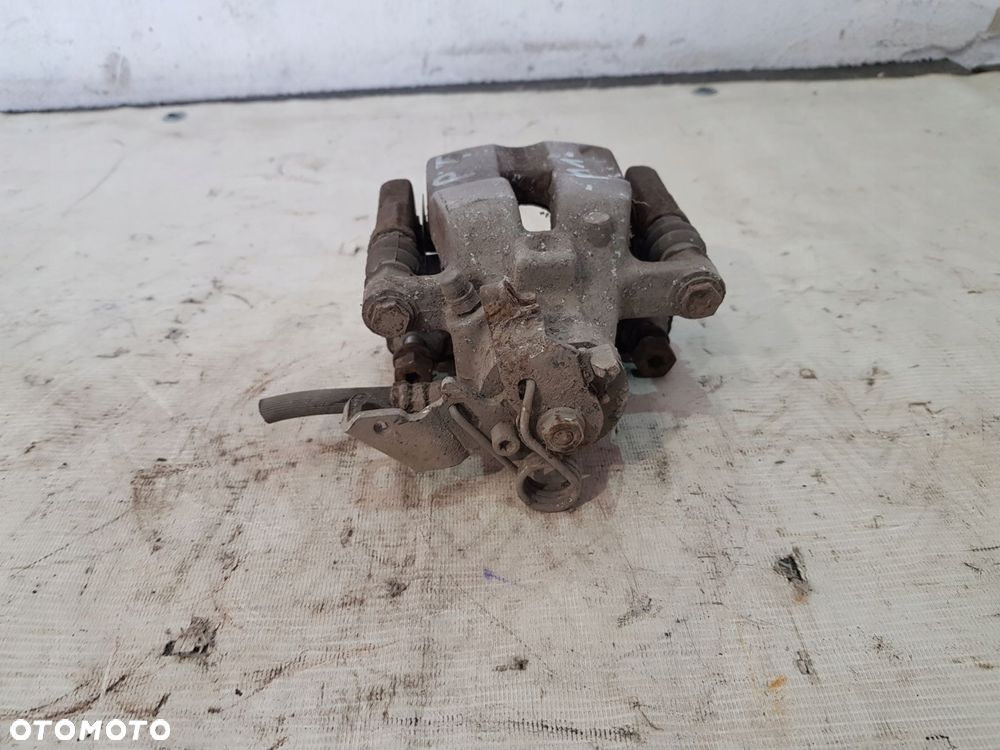 zacisk hamulcowy prawy tył fiat 500l 1.3d 12r- - 5