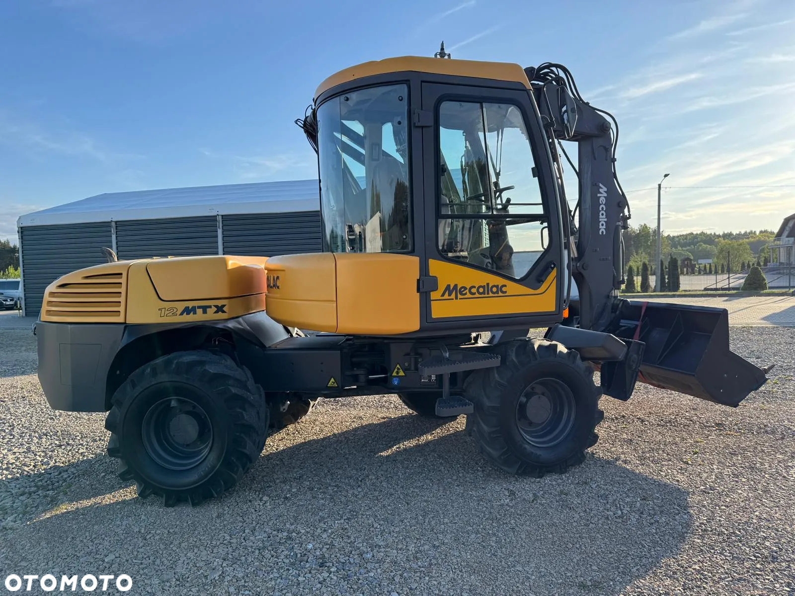 Mecalac 12 MTX 9260 kg Koparko Ładowarka - 24