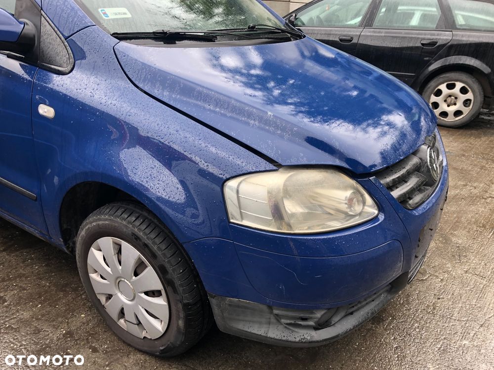 Lampa przód prawa lewa Volkswagen FOX 2007 r. - 4