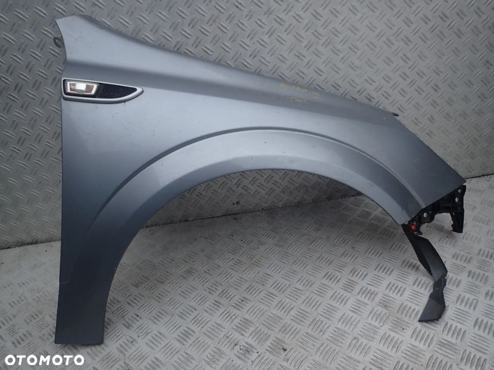 BŁOTNIK PRAWY PRZÓD OPEL ASTRA III - 1