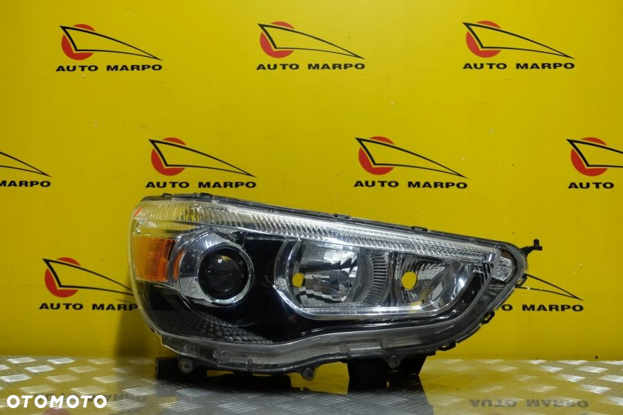 MITSUBISHI ASX RVR 10- REFLEKTOR LAMPA ZWYKŁA USA - 2