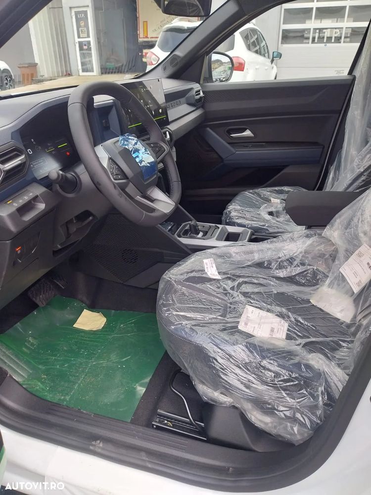 Dacia Duster HEV 140 Journey - 11