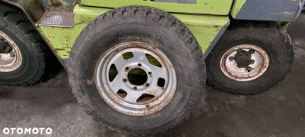 ZAPAS TROOPER ISUZU 15X6J 6X139.7 BRIDGESTONE DESERT DUELER 215SR15 - 1