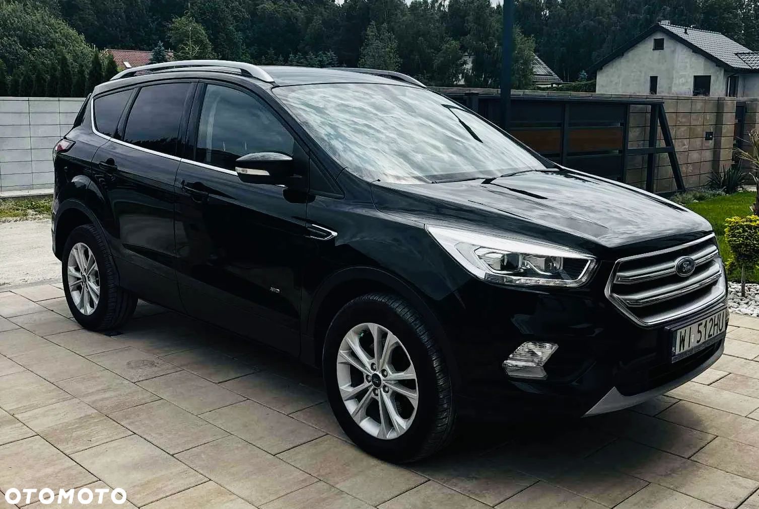 Ford Kuga 2.0 TDCi AWD Titanium - 1